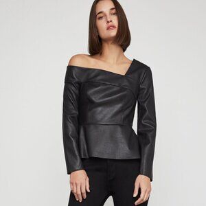 BCBGMaxazria Supple faux leather and a one-shoulder design lend a sleek, urban l